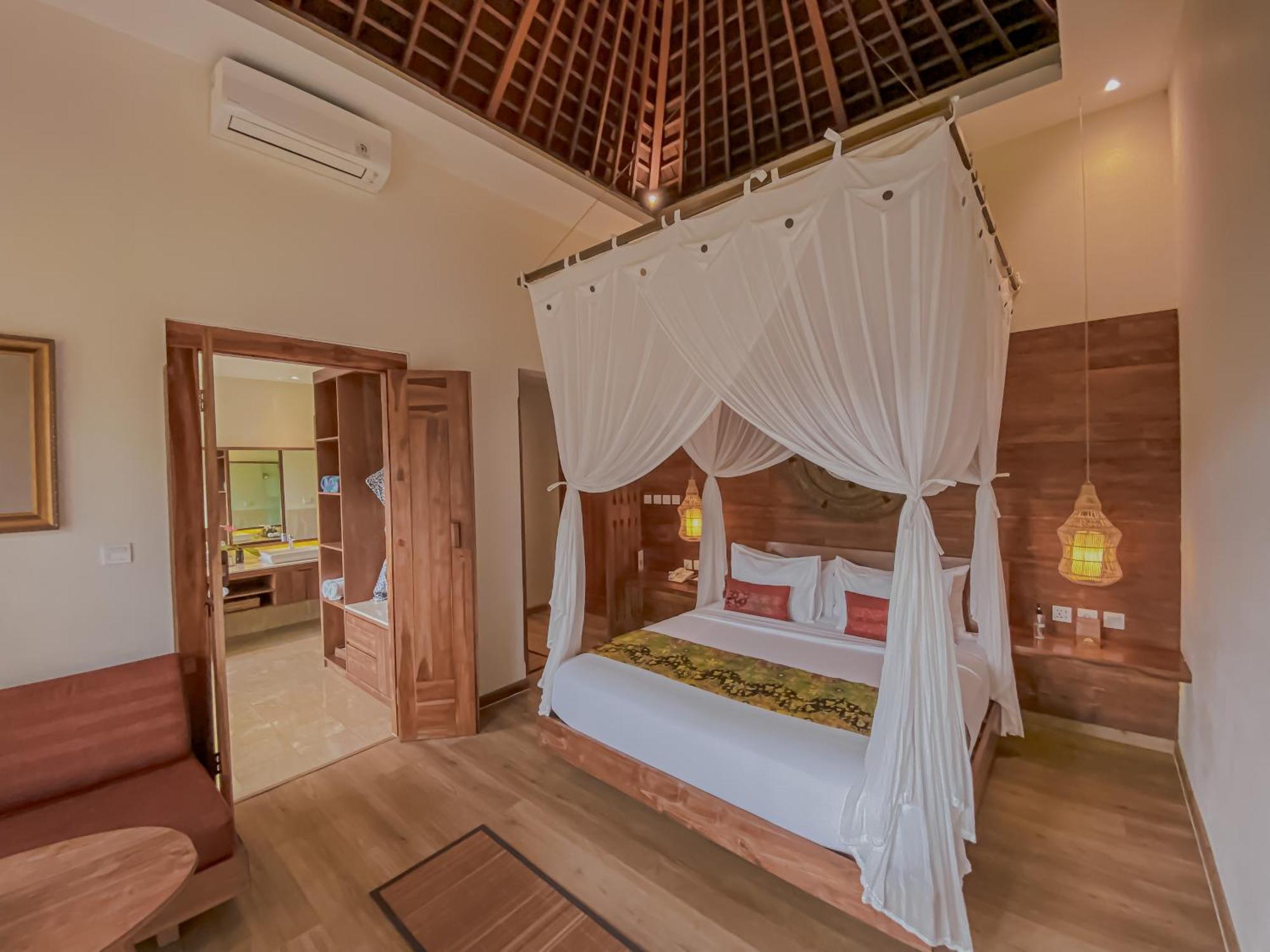 The Sebali Resort Ubud Buitenkant foto A bedroom at the resort